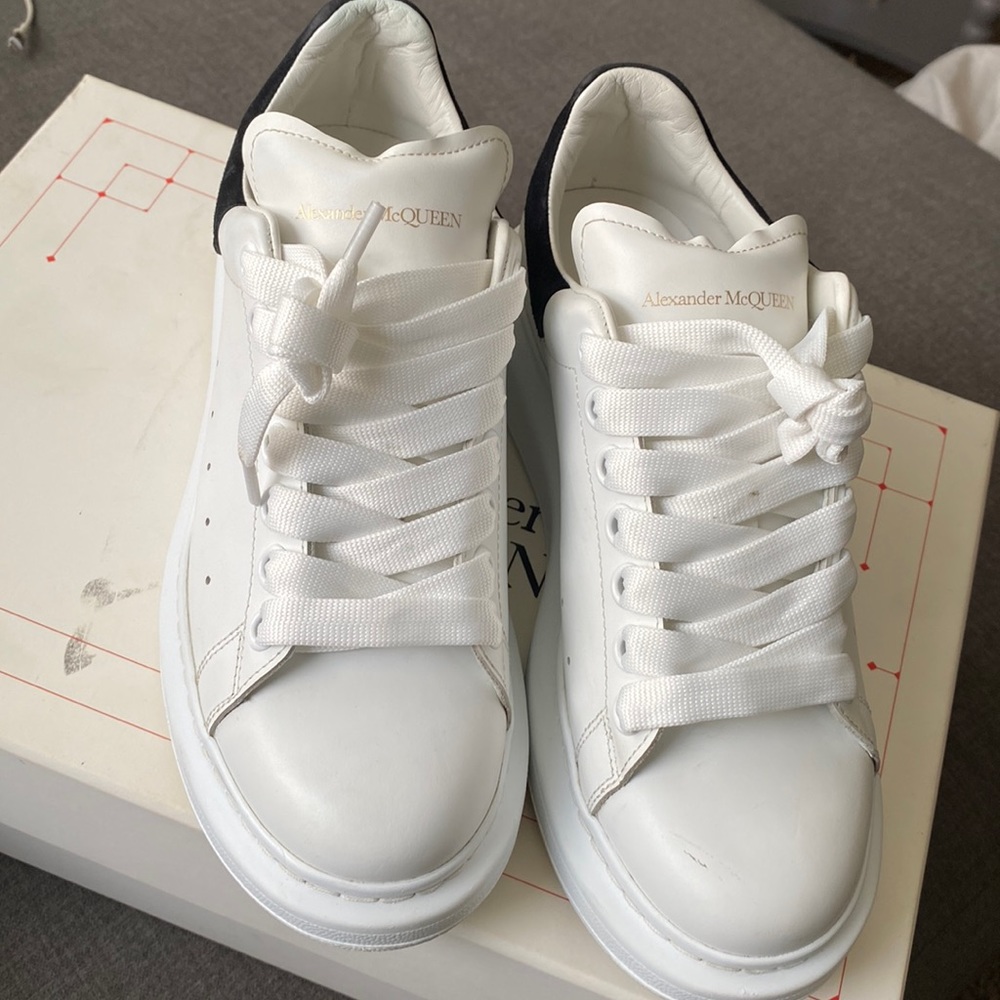 37 1/2 Alexander McQueen sneakers, all white with black label on back of shoe
